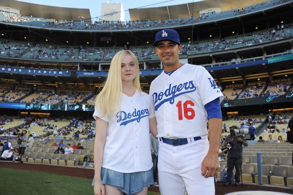 Elle Fanning Throws Out The Pitch At The Los Angeles Dodgers v. Chicago White Sox Game