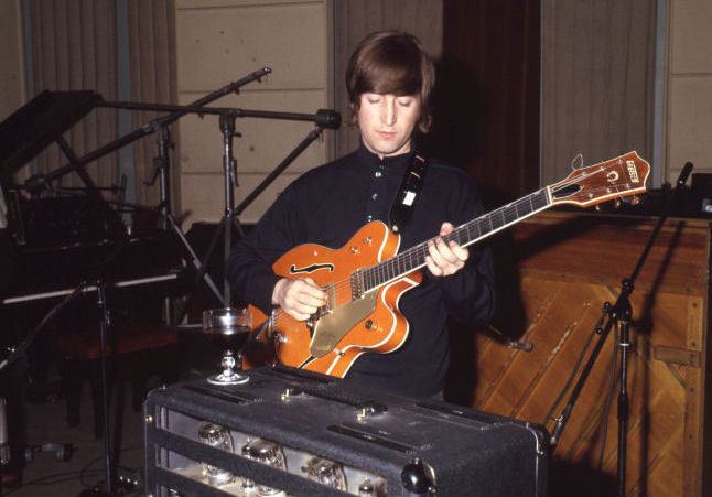 John Lennon in the studio with his Gretsch 6120 Guitar