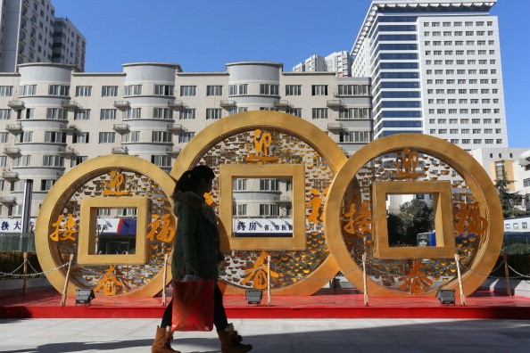 China's GDP Up 7.7 Percent In 2013