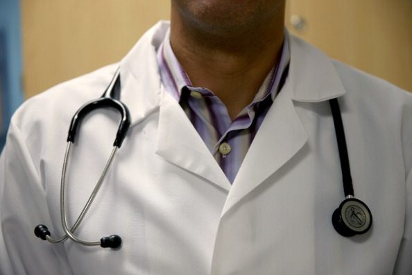  A doctor wears a stethoscope