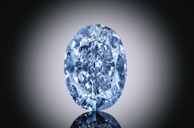 Sotheby's Superb and Rare Fancy Vivid Blue Diamond and Diamond Ring 4