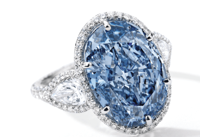 Sotheby's Superb and Rare Fancy Vivid Blue Diamond and Diamond Ring