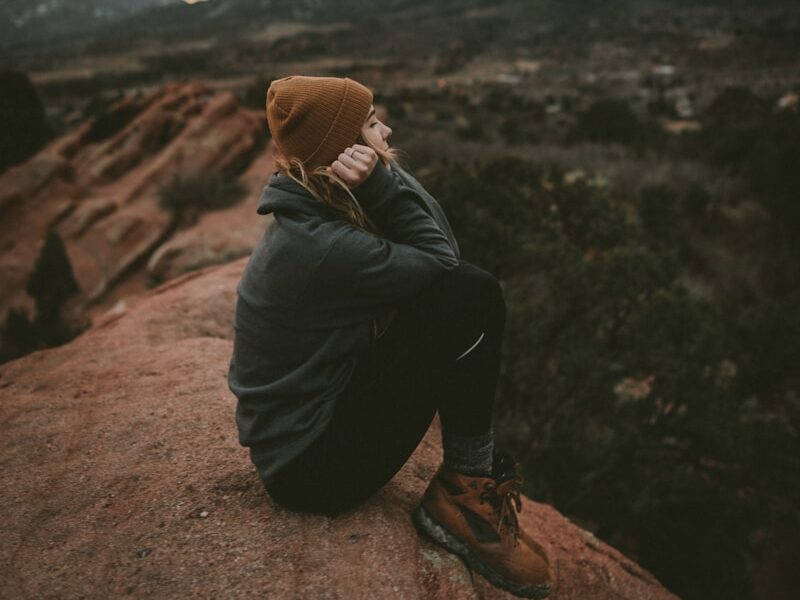 woman in green jacket