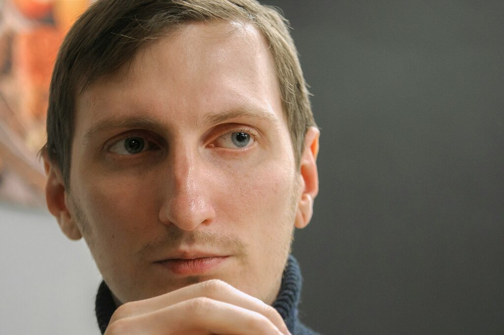 man in black and white jacket