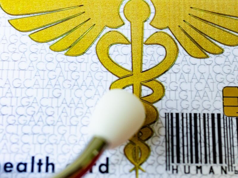 A close up of a medical id tag on a table