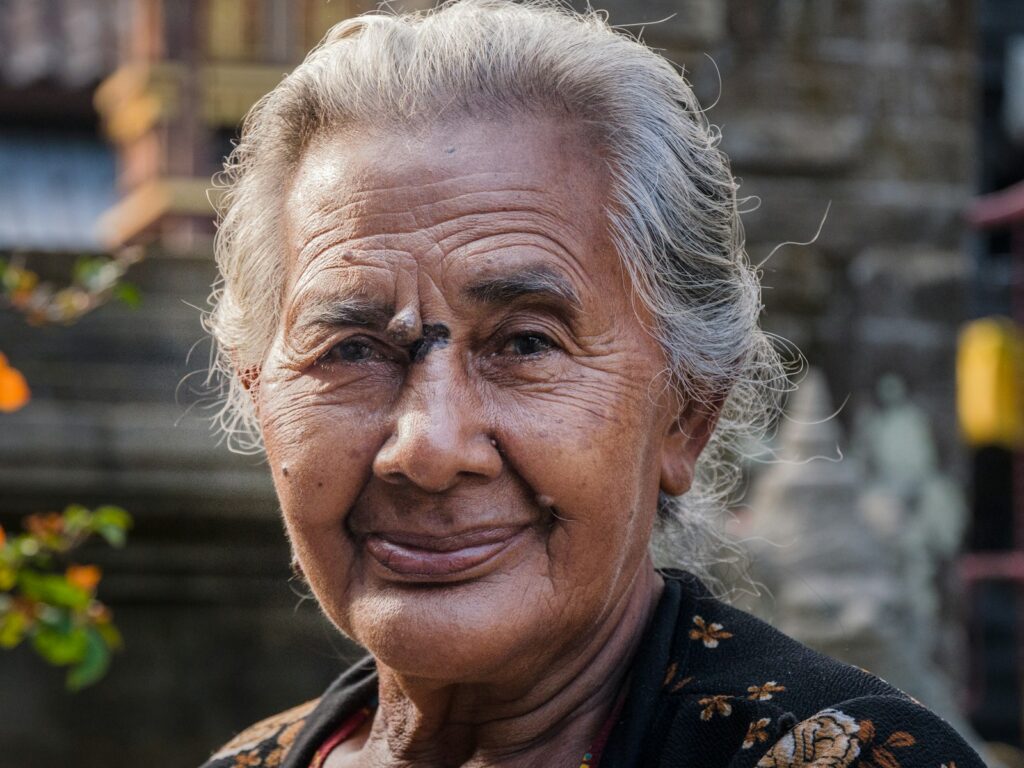man in black and yellow floral shirt