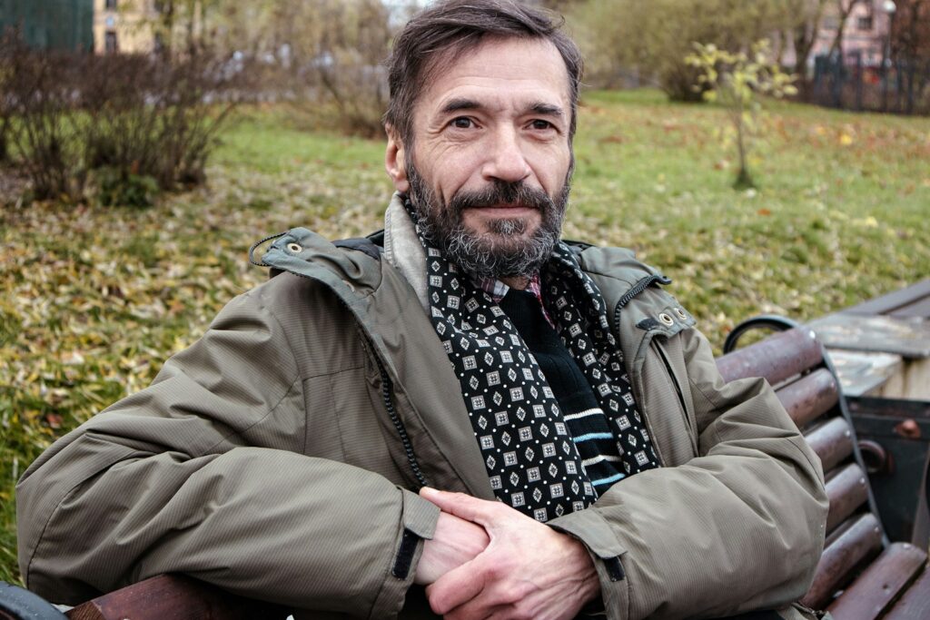 a man sitting on a bench