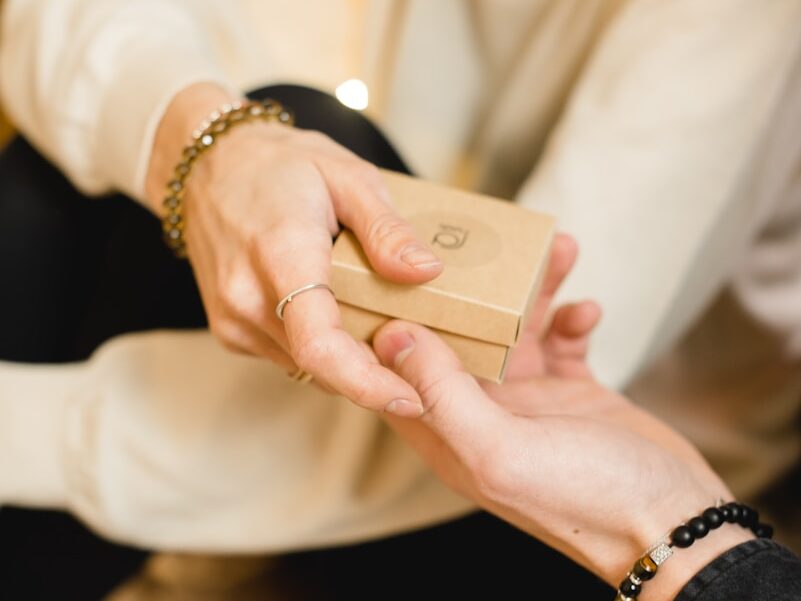 person holding gold iphone 6