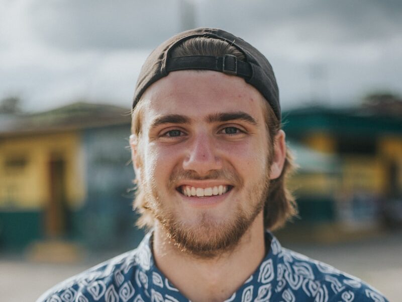 person wearing blue top smiling