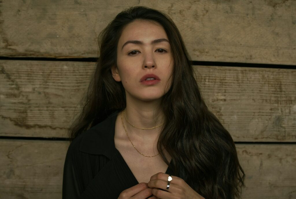 woman in black blazer and silver ring