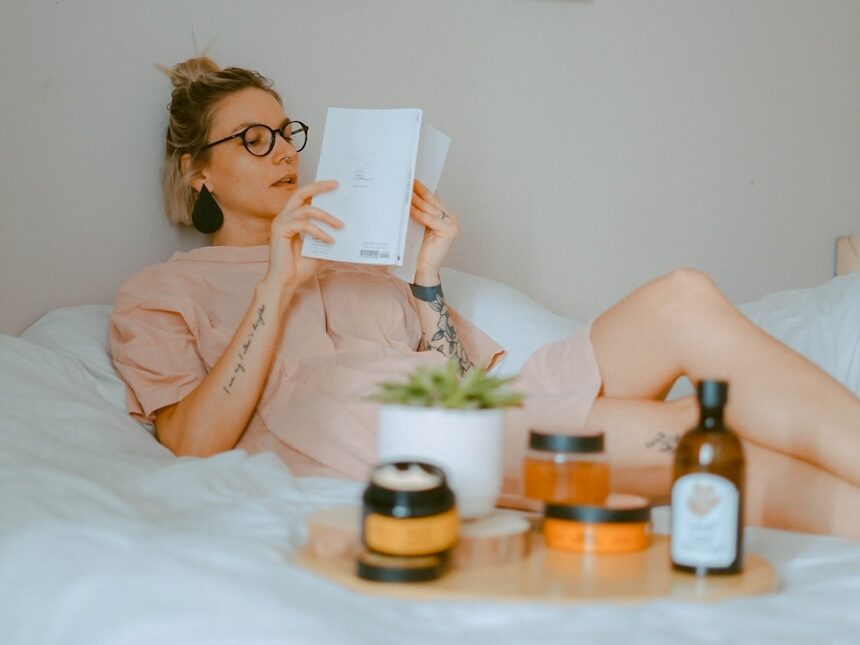 unknown person reading book indoors