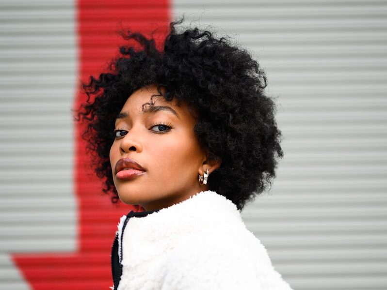 woman in white and red shirt