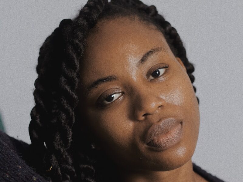 woman in black tank top