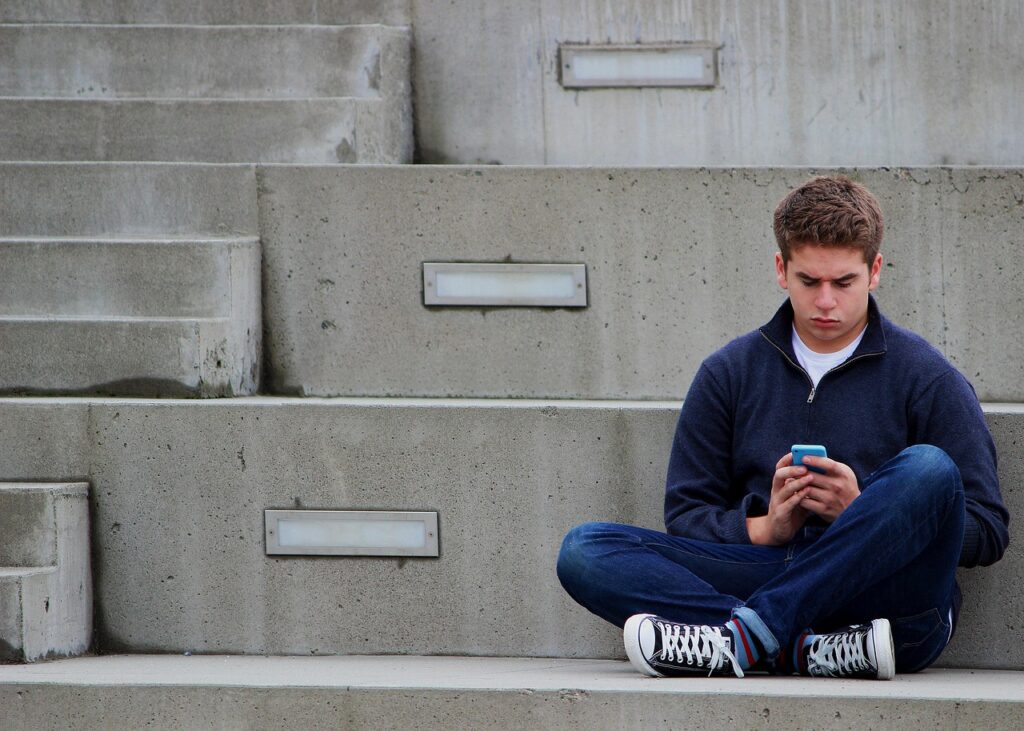 texting, boy, teenager, sitting, outdoor, blue, texting, texting, teenager, teenager, teenager, teenager, teenager