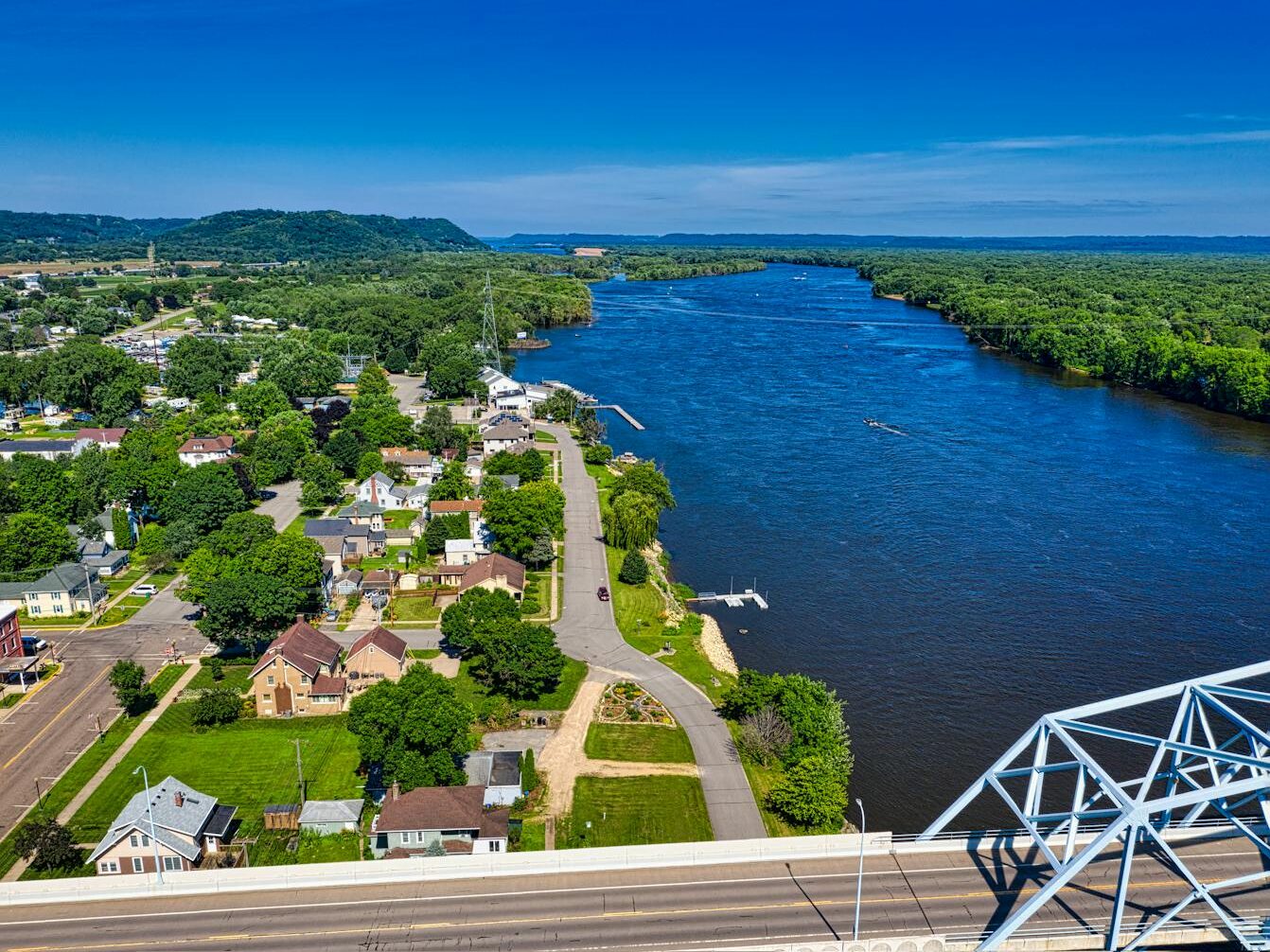 Explore the scenic aerial view of Wabasha, MN by the Mississippi River, showcasing nature and architecture.