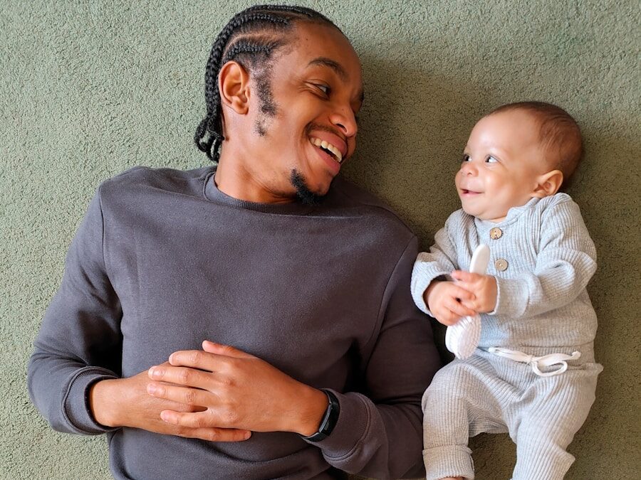 a person holding a baby