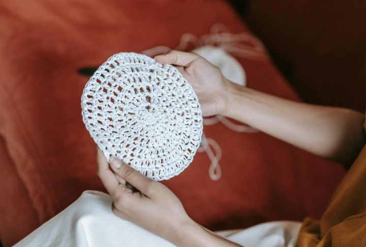 Stacks Of Tablecloths, Doilies, And Napkins