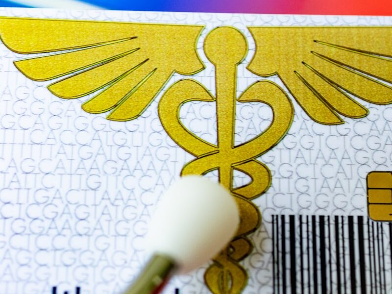 A close up of a medical id tag on a table