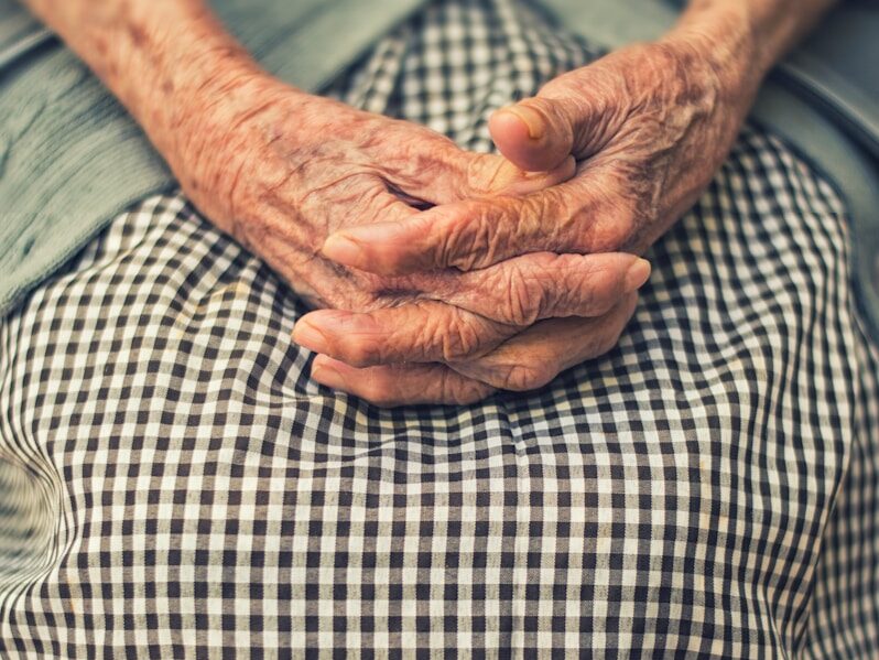 person's hand in shallow focus