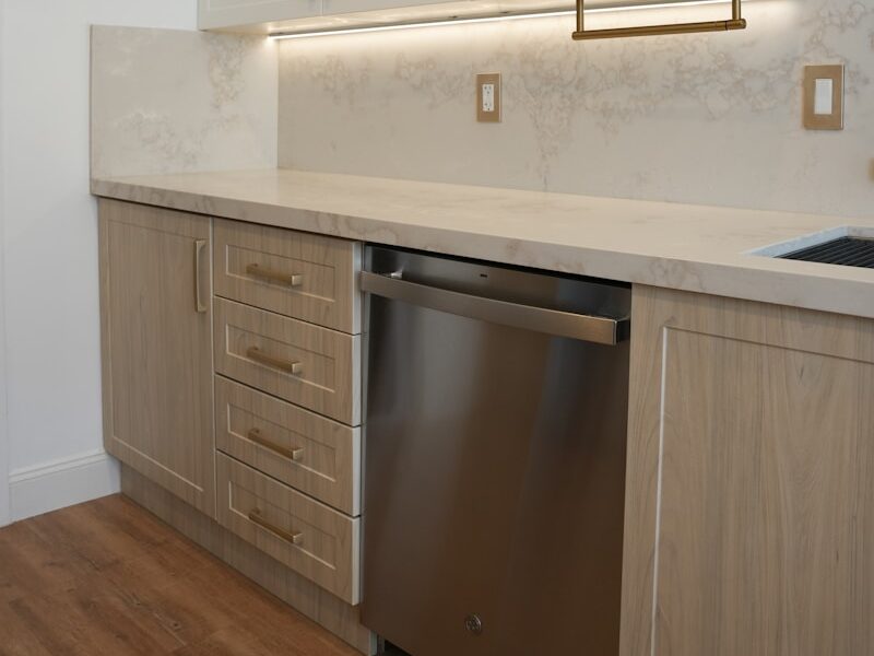 a kitchen with a dishwasher and a sink