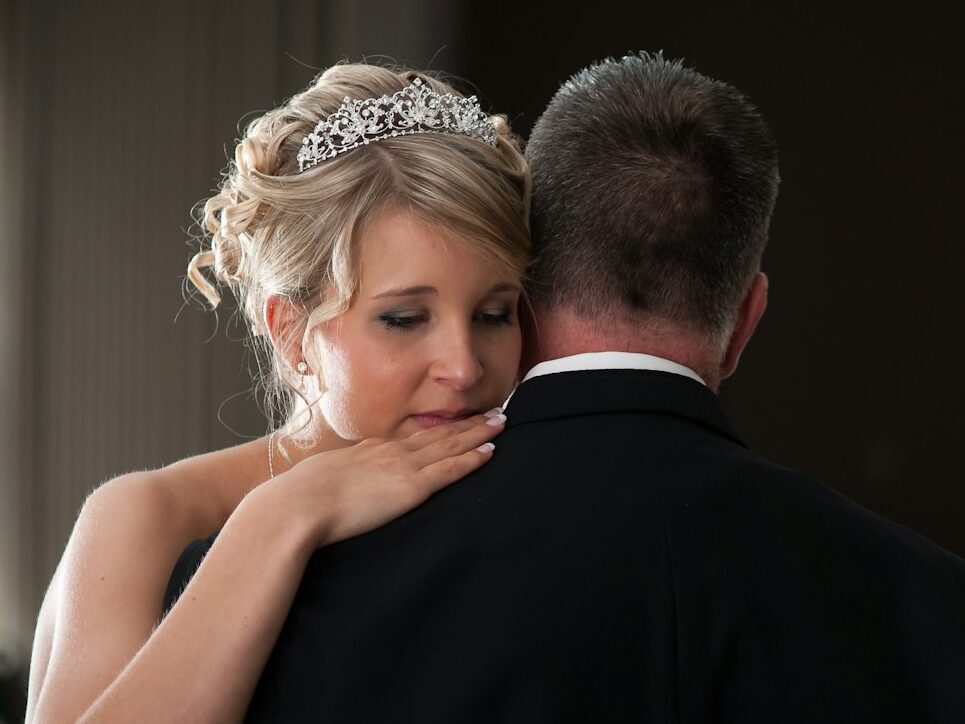 a man and woman kissing