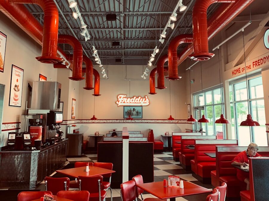 red and black chairs and tables