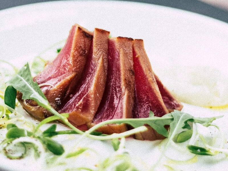 roasted meat served on ceramic plate