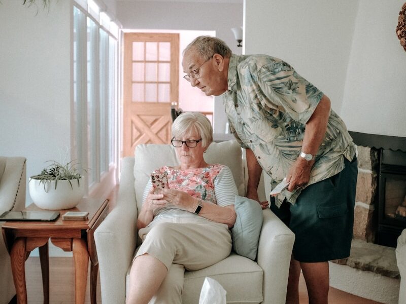 a woman and a man in a living room
