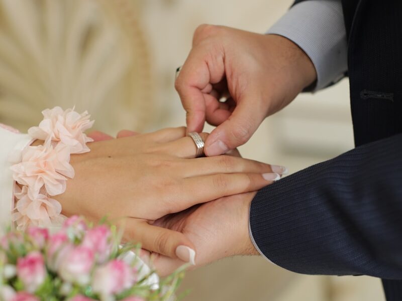 man and woman holding hands