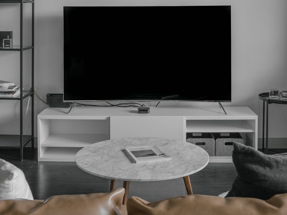 flat screen TV displaying black screen