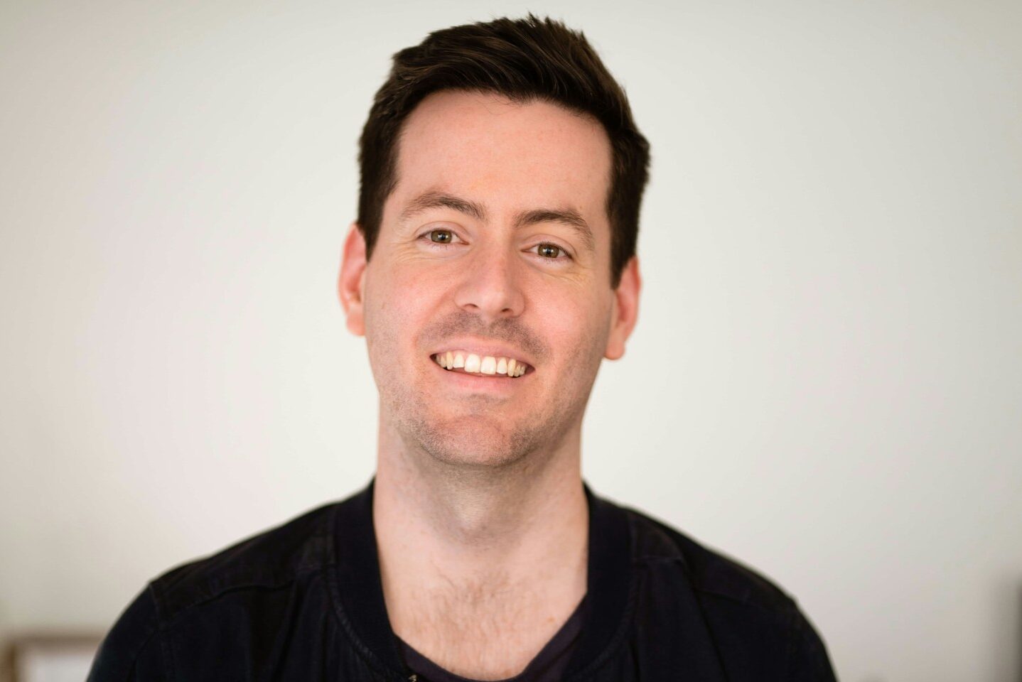 a man smiling for the camera