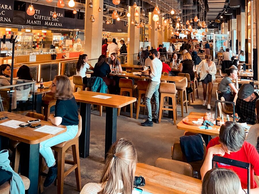 people sitting on chair in restaurant
