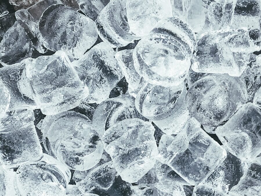 clear glass round ornament on gray stone