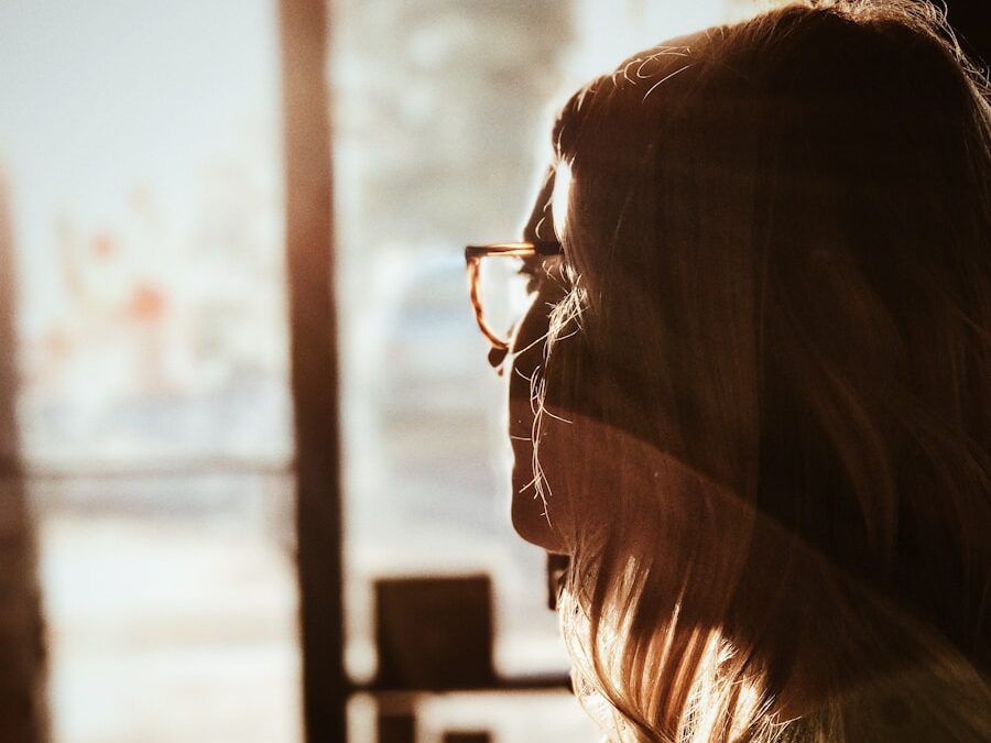 shallow focus photography of woman facing door