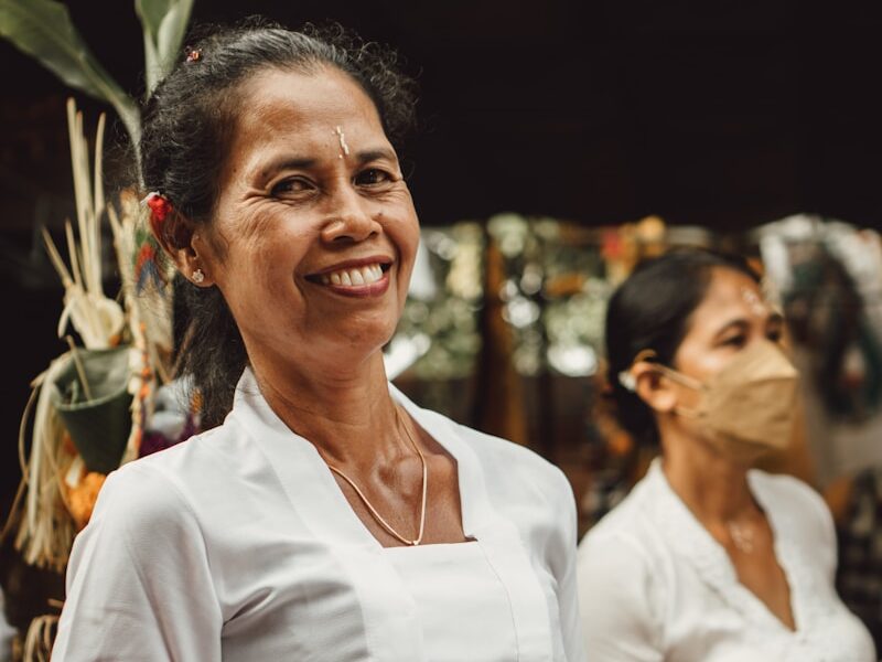 a person holding a plate of food