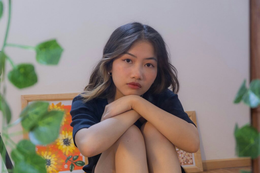 woman in blue long sleeve shirt