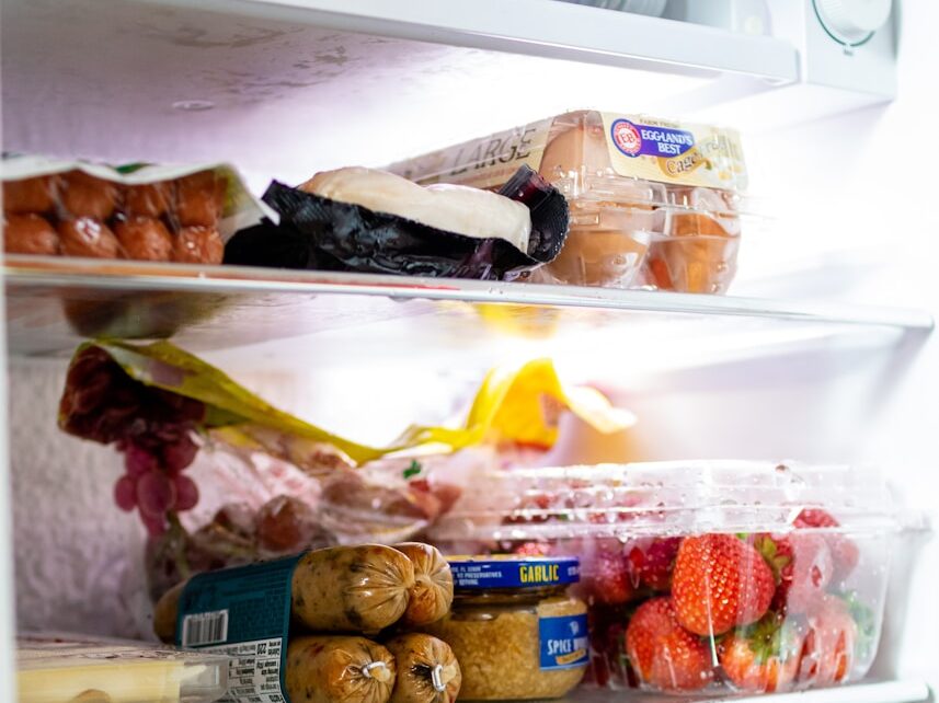a refrigerator filled with lots of food and drinks