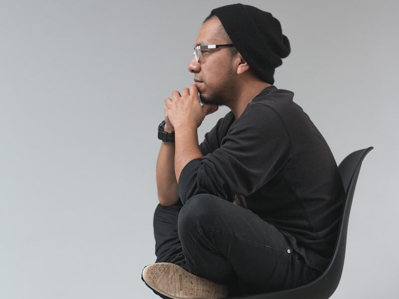 man sitting on chair