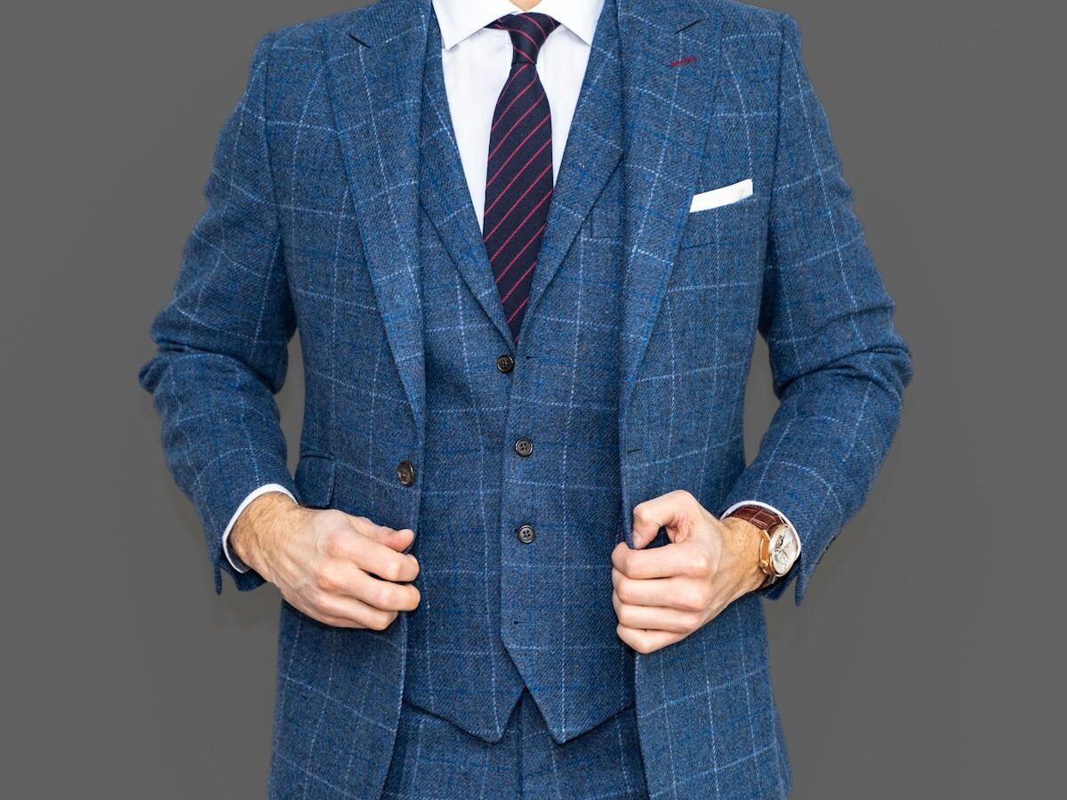 man in blue suit jacket
