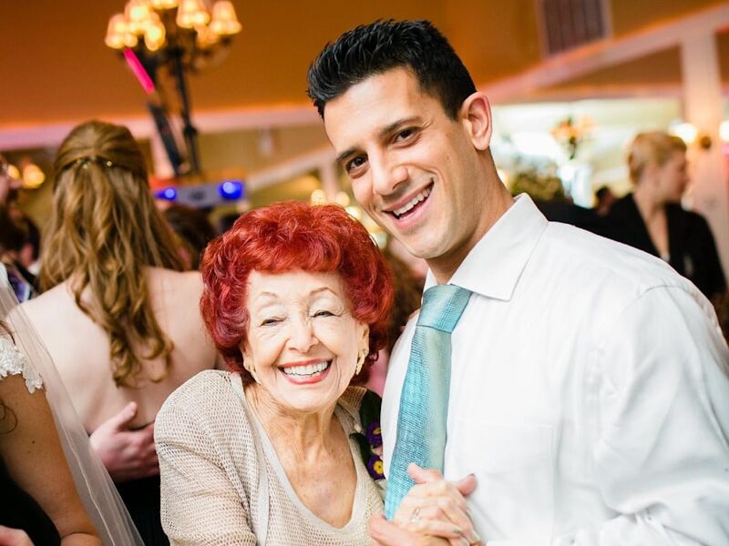 man and grandmother dancing