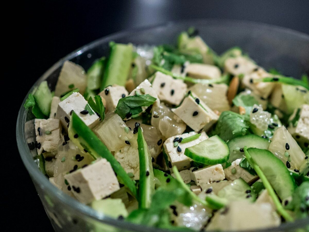 sliced of vegetables in clear glass bowl