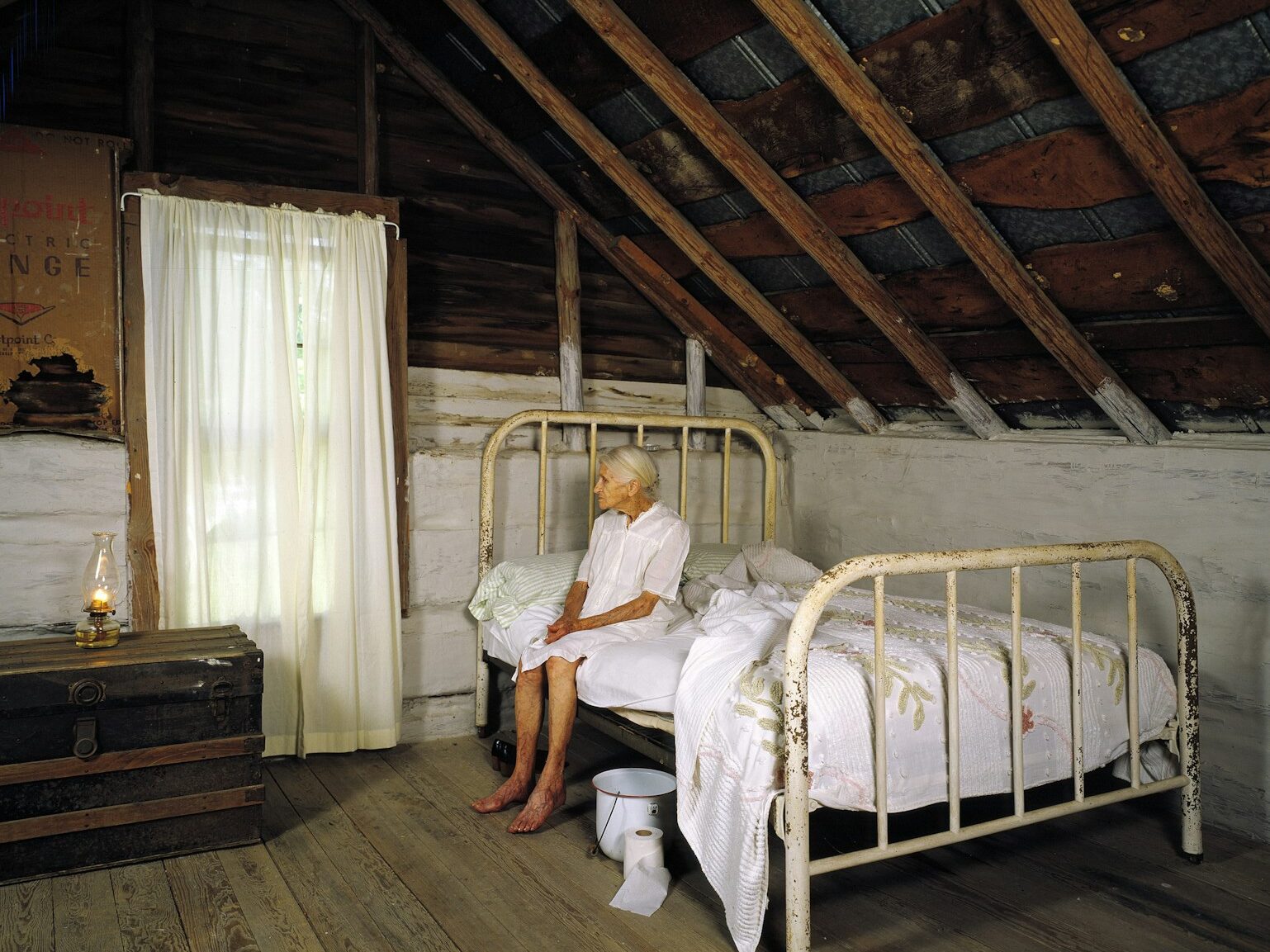 Carol Highsmith’s Aunt Kate on her 90th birthday in the log cabin where her Grandfather and Great Grandfather were born